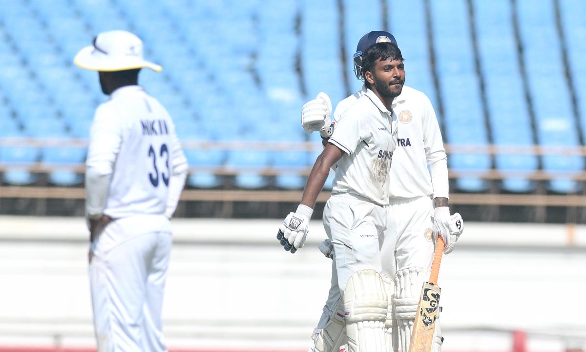 Chetan Sakariya reacts after hitting a six to snatch the first-innings lead for Saurashtra.