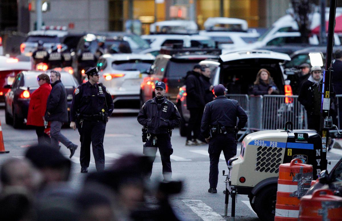 Police officers stand outside Manhattan Criminal Court after former U.S. President Donald Trump’s indictment by a Manhattan grand jury following a probe into hush money paid to porn star Stormy Daniels, in New York City, U.S. onMarch 30, 2023. 