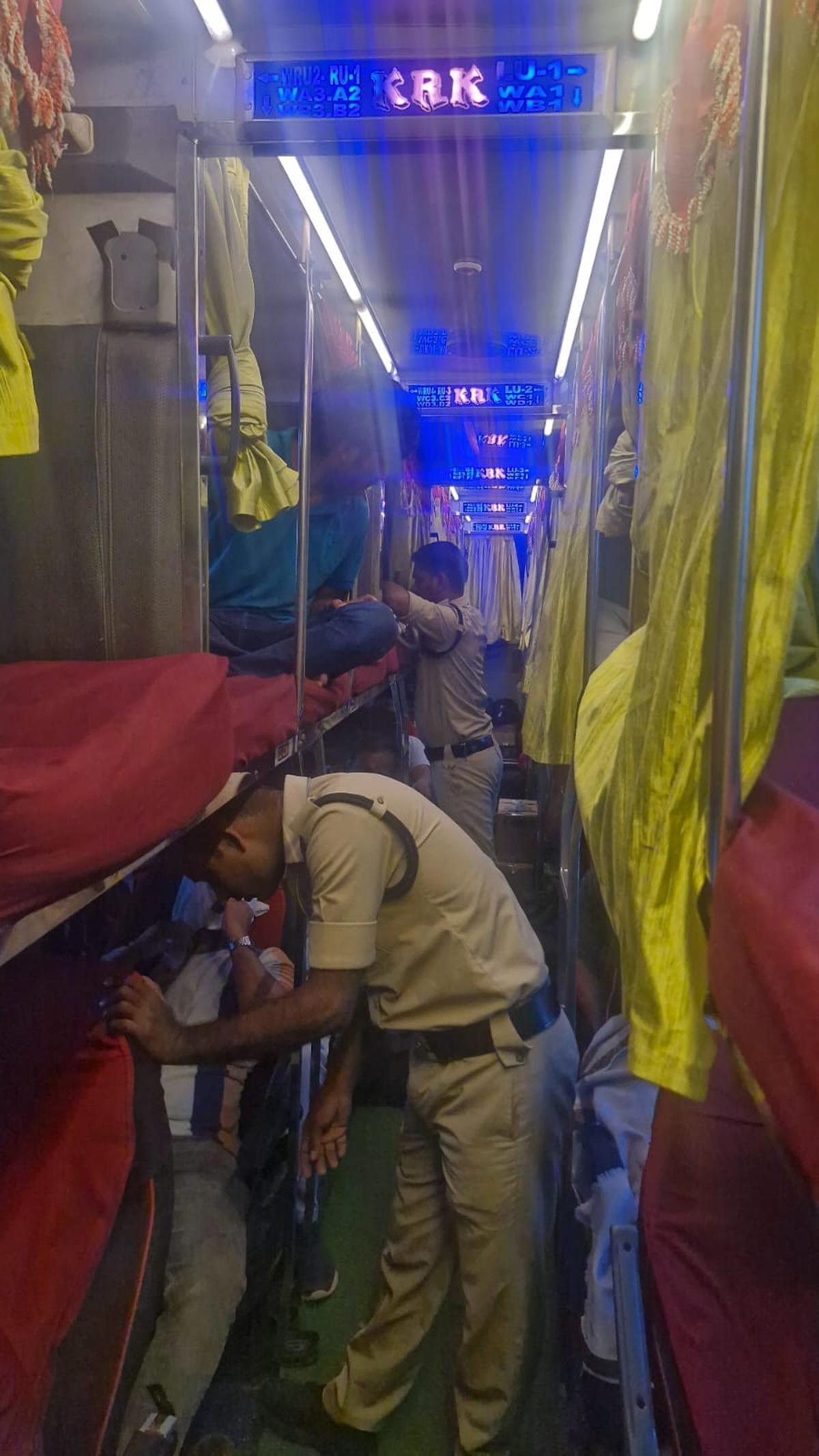 Rangareddy excise enforcement team carrying out searches in the bus