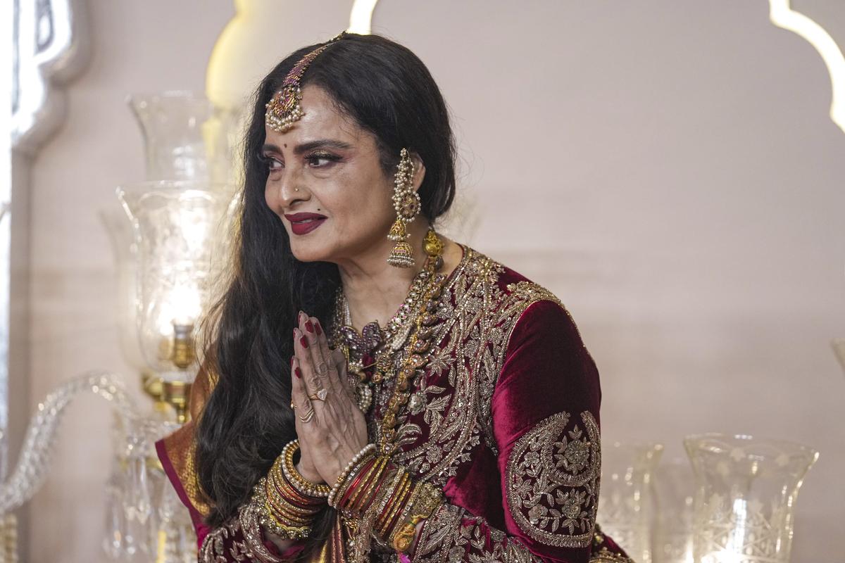 Mumbai: Actor Rekha poses for pictures upon her arrival to attend Anant Ambani and Radhika Merchant’s wedding, in Mumbai, Friday, July 12, 2024 Mumbai: Actor Rekha poses for pictures upon her arrival to attend Anant Ambani and Radhika Merchant’s wedding, in Mumbai, Friday, July 12, 2024