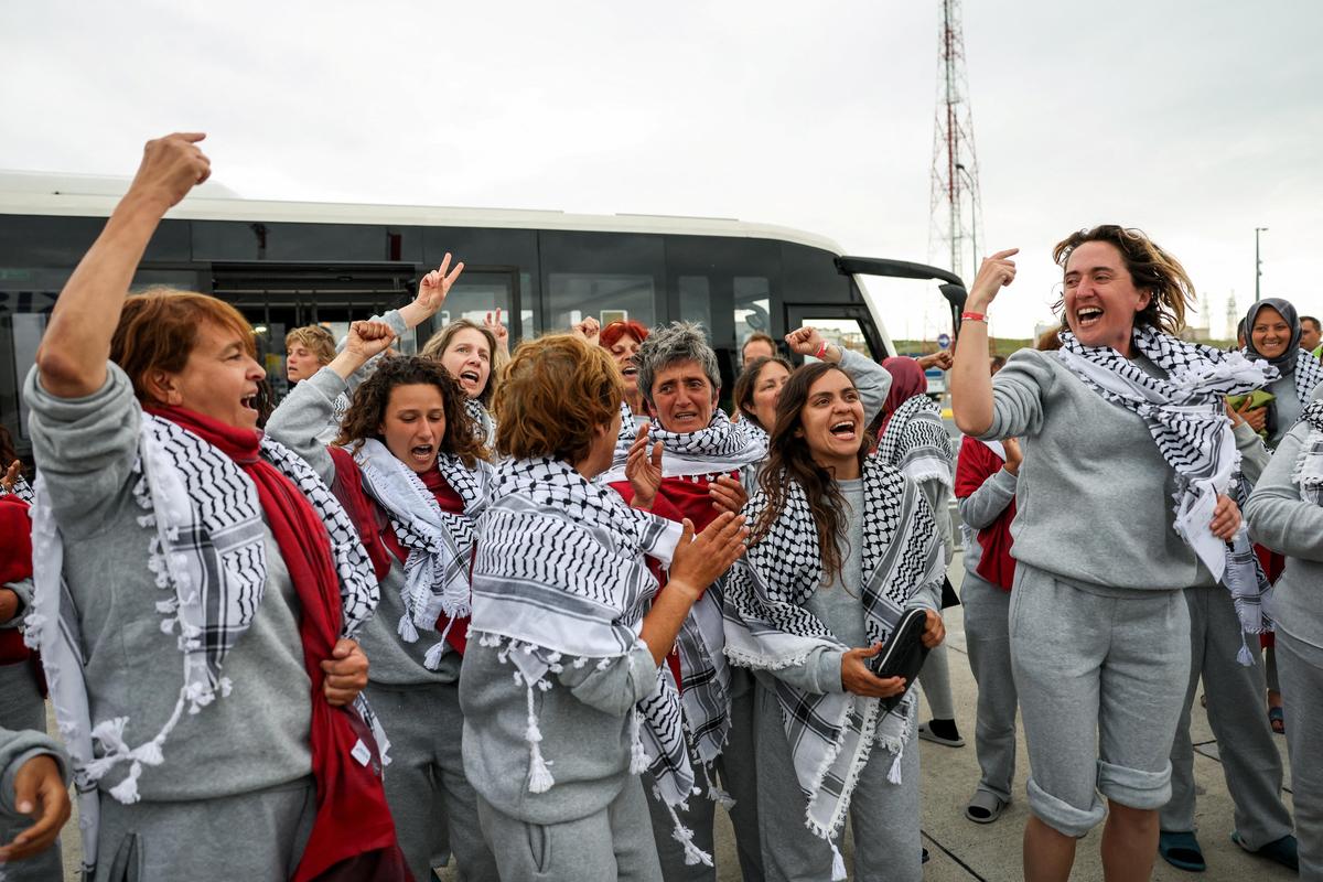 Activists from the Gaza-bound Flotilla ship, detained by Israeli forces after their vessels were intercepted in international waters in the Mediterranean, upon arrival at Istanbul Airport, Türkiye, on May 21, 2026.