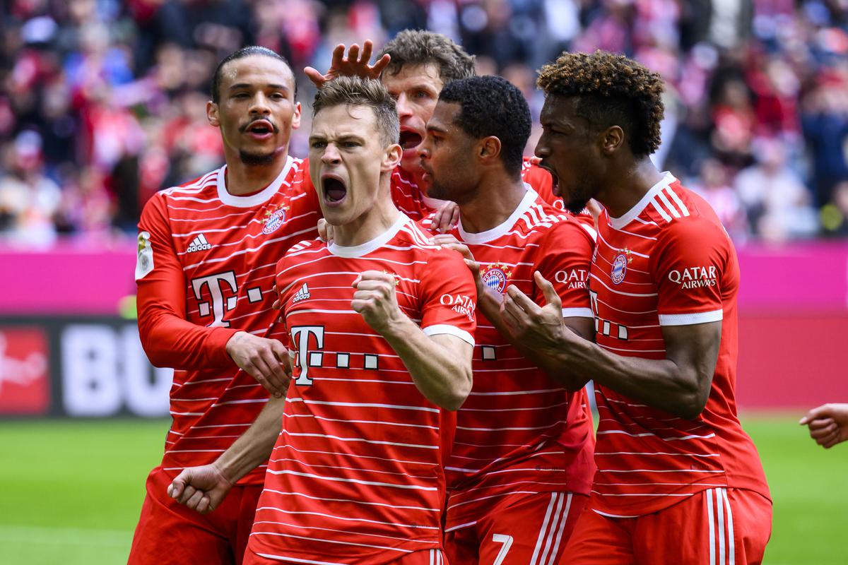 Munich’s scorer Joshua Kimmich, front left, celebrates with his teammates after scoring his side’s second goal during the German Bundesliga soccer match between FC Bayern Munich and FC Schalke 04 in Munich, Germany, Saturday, May 13, 2023. 