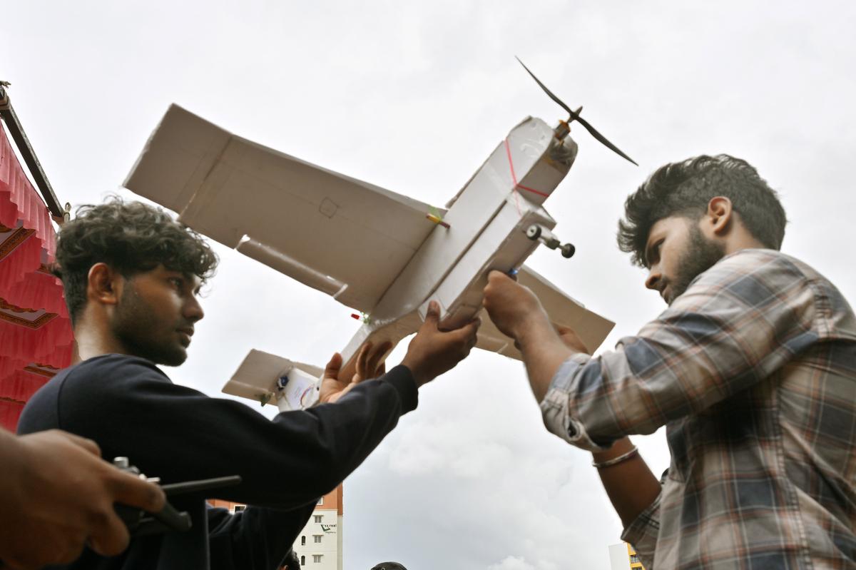 An aircraft model being checked before the competition