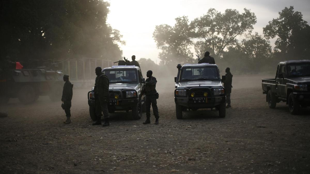 Loud blasts, gunfire heard near Mali's main military camp, witness says