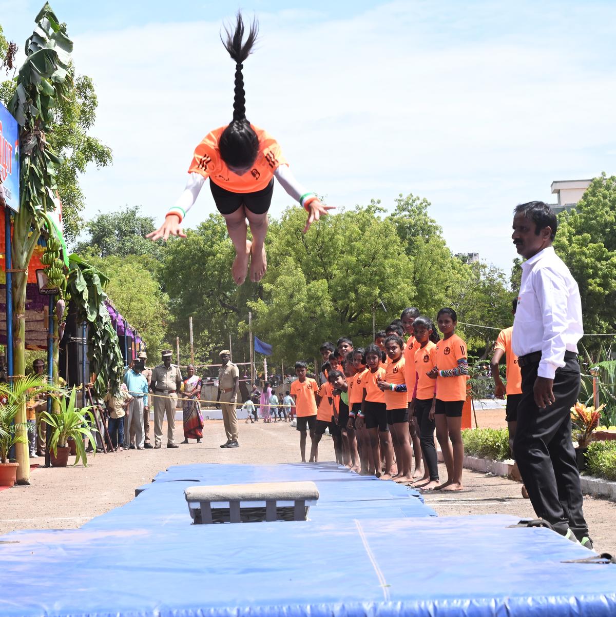 A school student performing gymnastics during Independence Day celebrations at Armed Reserve Police Ground in Madurai on Friday.