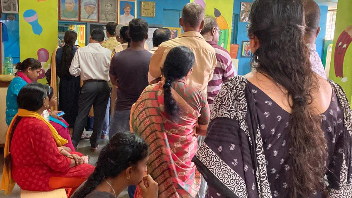 Uneven distribution of voters in two booths leads to argument between voters and officials in Bengaluru