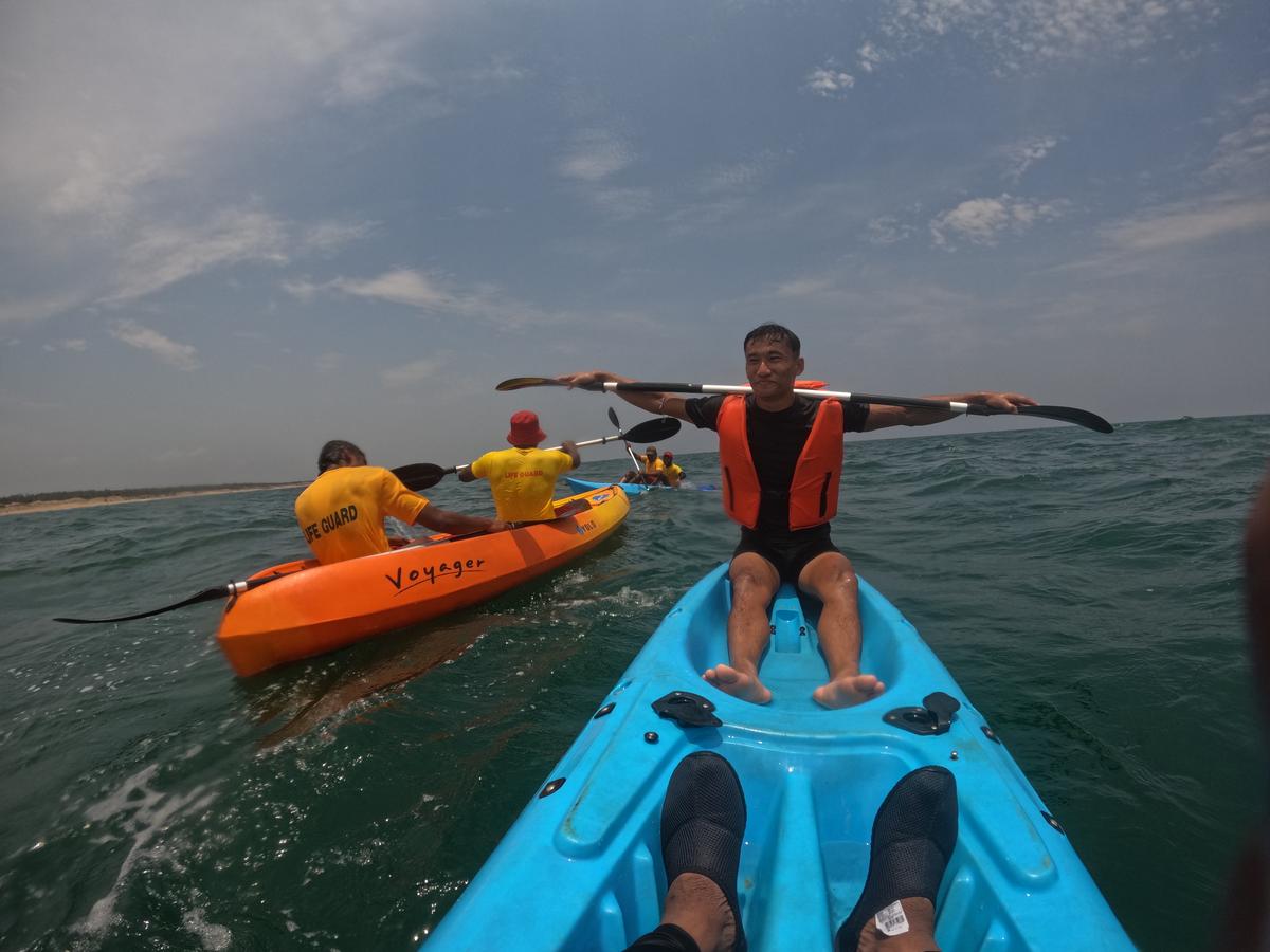 People kayaking at Baruva beach.