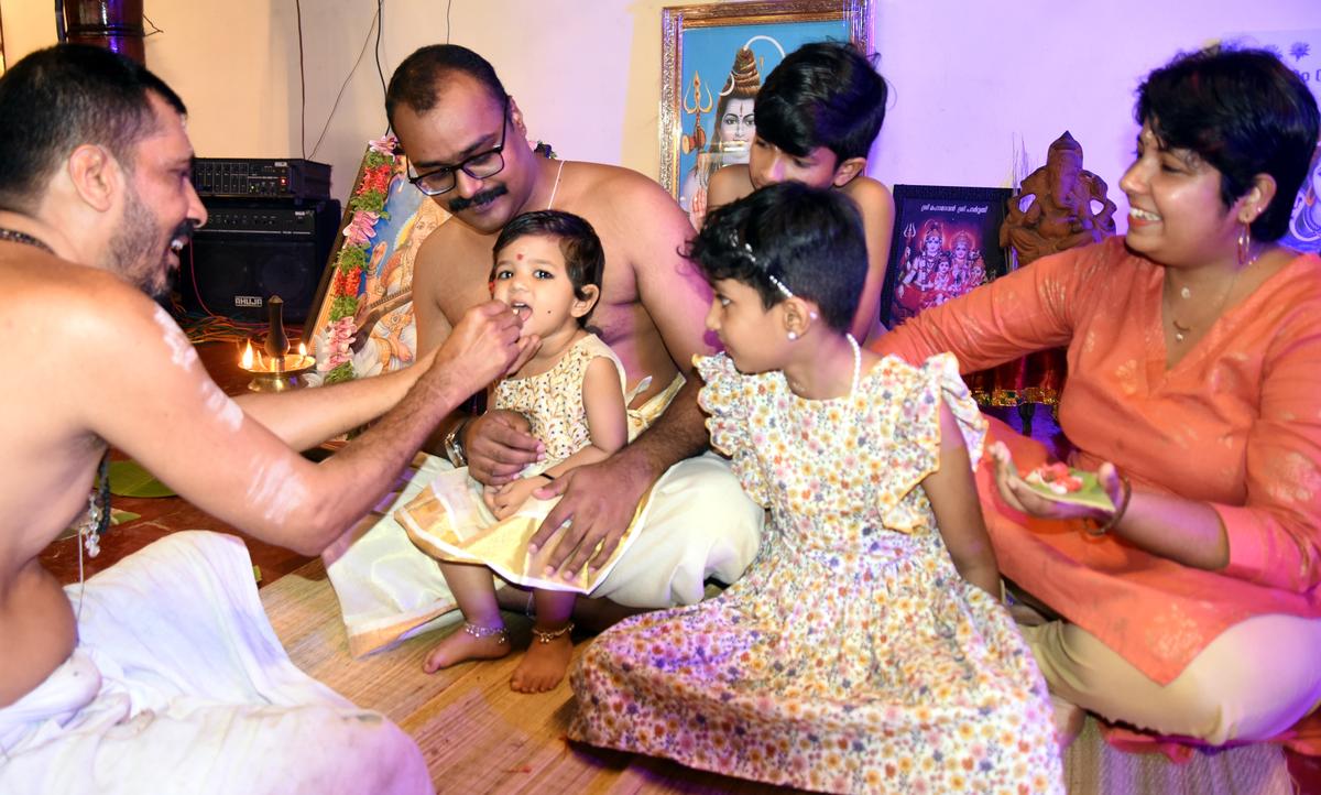 Vidyarambham ceremony in progress at Tali Mahadeva Temple in Kozhikode.