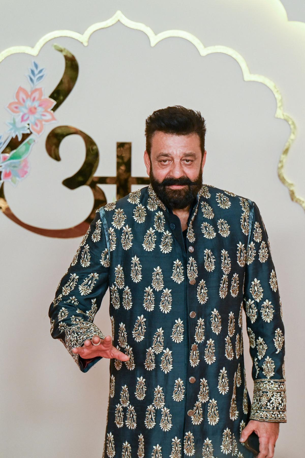 Bollywood actor Sanjay Dutt poses for photos as he arrives to attend the wedding ceremony of billionaire tycoon and Chairman of Reliance Industries Mukesh Ambani’s son Anant Ambani and Radhika Merchant in Mumbai on July 12, 2024. Bollywood actor Sanjay Dutt poses for photos as he arrives to attend the wedding ceremony of billionaire tycoon and Chairman of Reliance Industries Mukesh Ambani’s son Anant Ambani and Radhika Merchant in Mumbai on July 12, 2024.