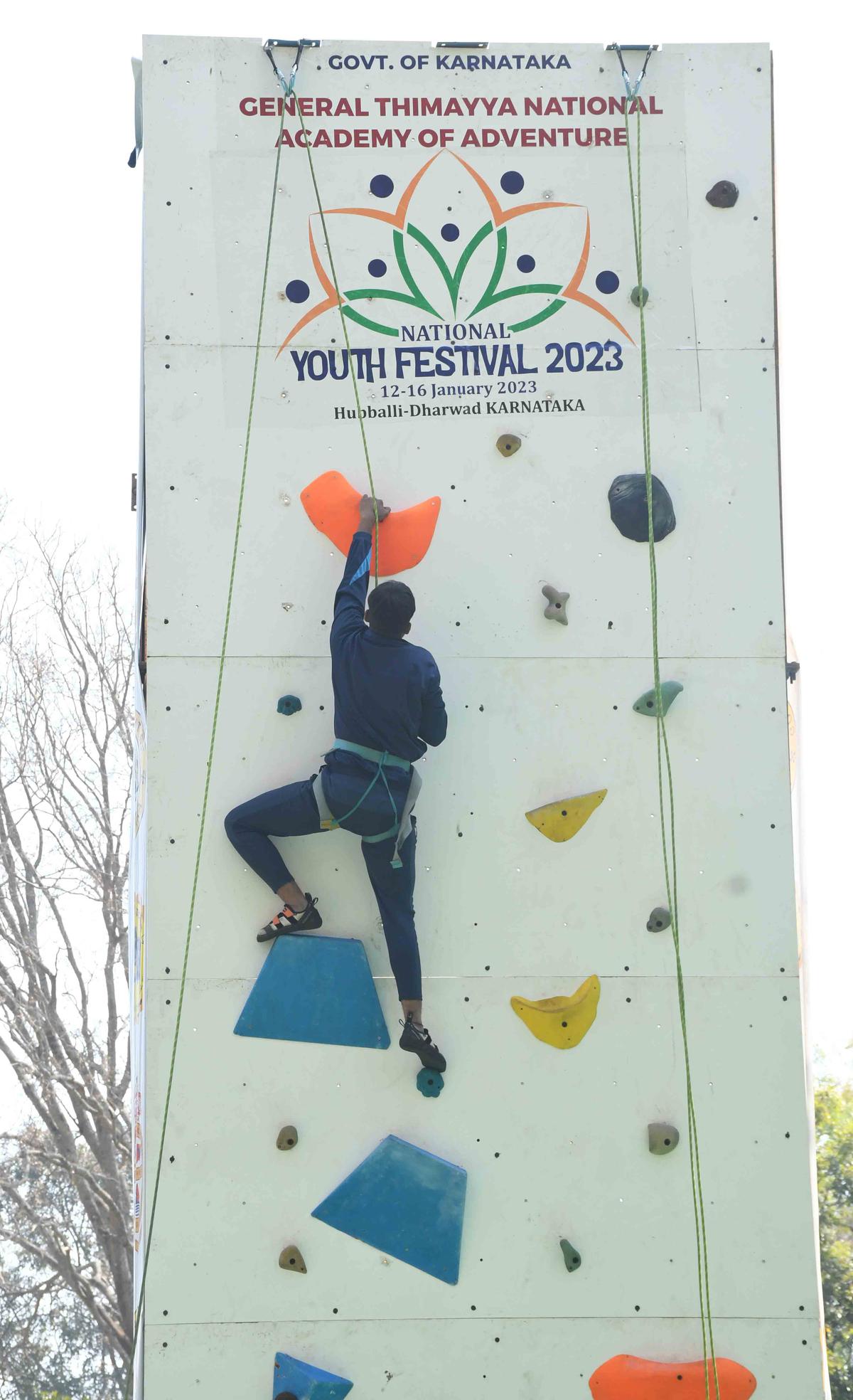Participants testing their skills in rock climbing at the 26th National Youth Festival on Karnatak College campus in Dharwad on Saturday.  