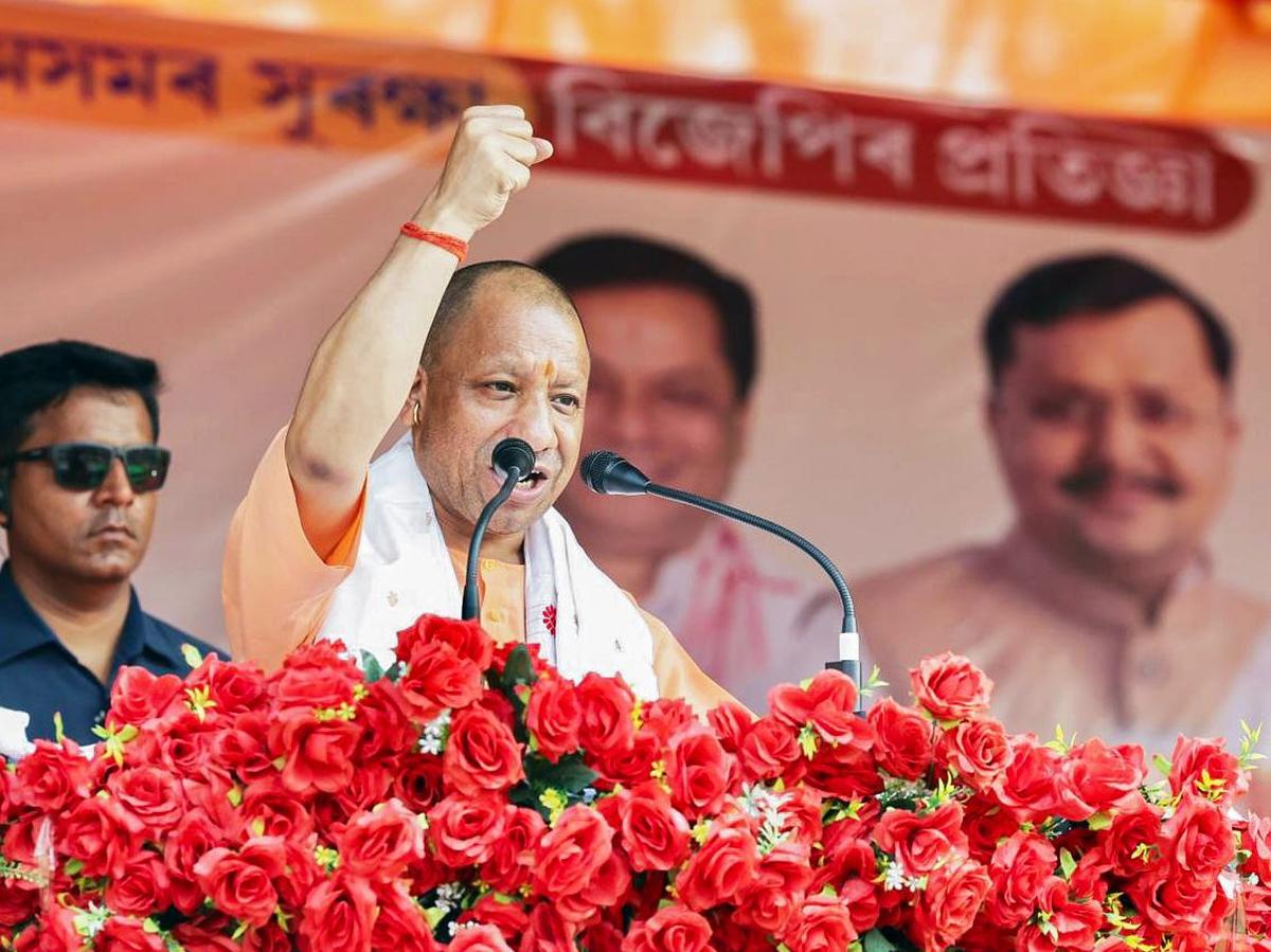 In poll-bound Assam, Adityanath stresses U.P. model of dealing with rioters