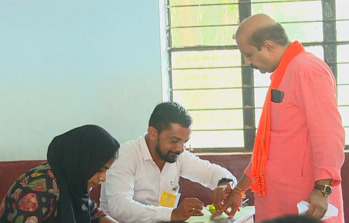 K. Raghupathi Bhat​, BJP rebel candidate for the Legislative Council elections from South West Graduates’ Constituency,​ casting his vote at Government Pre University College in Manipal on Monday.