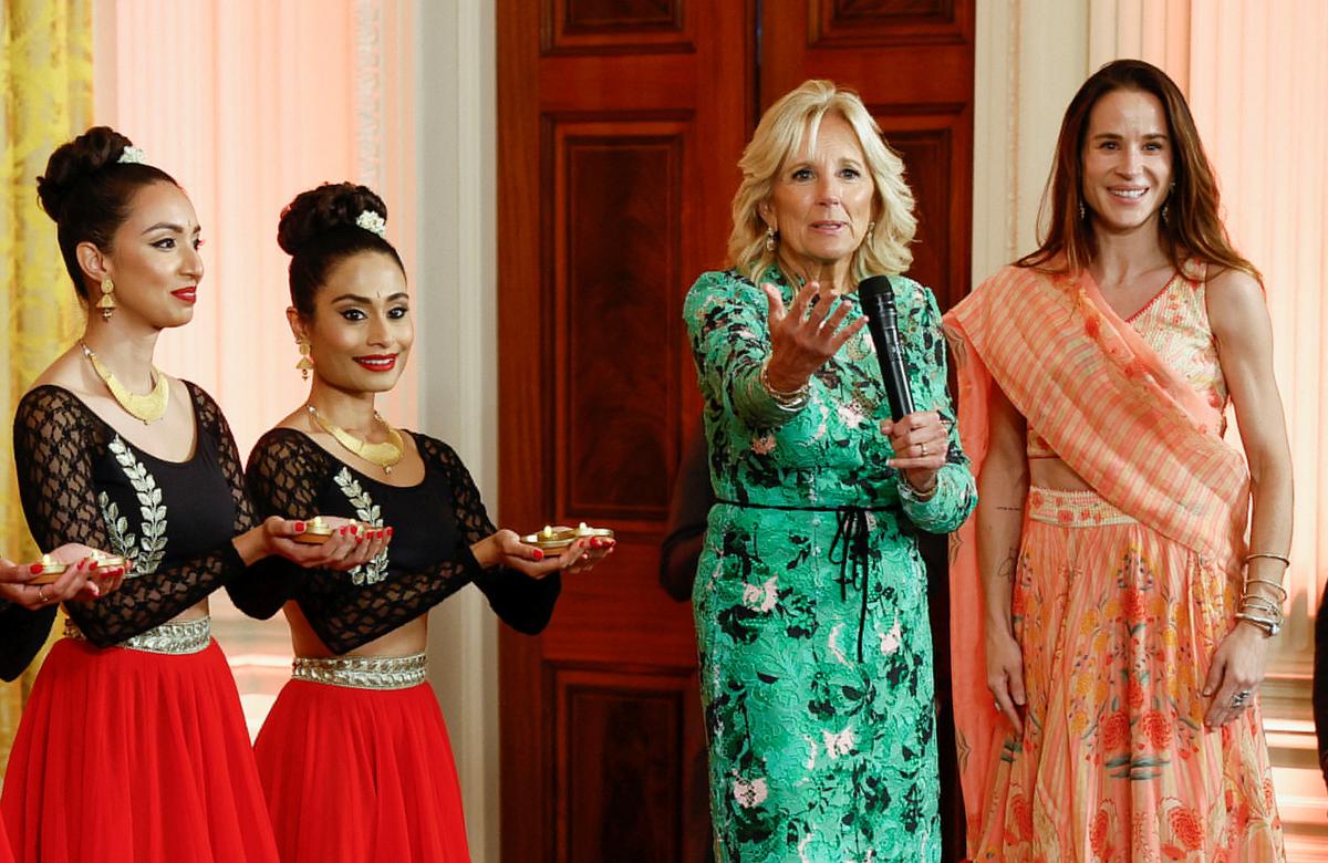 U.S. first lady Jill Biden speaks as her daughter Ashley Biden looks on during a reception to celebrate Deepavali at the White House