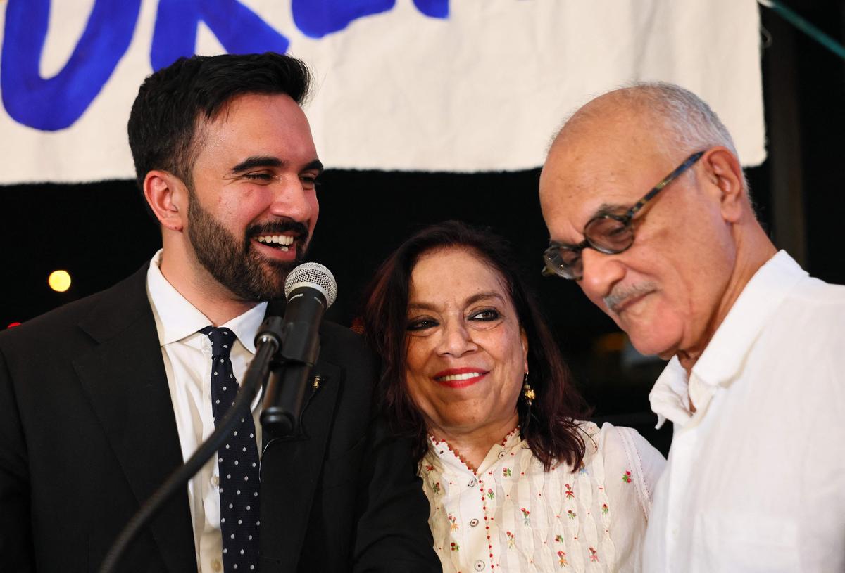 (L-R) New York mayoral candidate, State Rep. Zohran Mamdani (D-NY) stands with his mother Mira Nair, and father Mahmood Mamdani as they celebrate during an election night gathering at The Greats of Craft LIC on June 24, 2025 in the Long Island City neighborhood of the Queens borough in New York City. Photo: Getty Images via AFP (L-R) New York mayoral candidate, State Rep. Zohran Mamdani (D-NY) stands with his mother Mira Nair, and father Mahmood Mamdani as they celebrate during an election night gathering at The Greats of Craft LIC on June 24, 2025 in the Long Island City neighborhood of the Queens borough in New York City. Photo: Getty Images via AFP