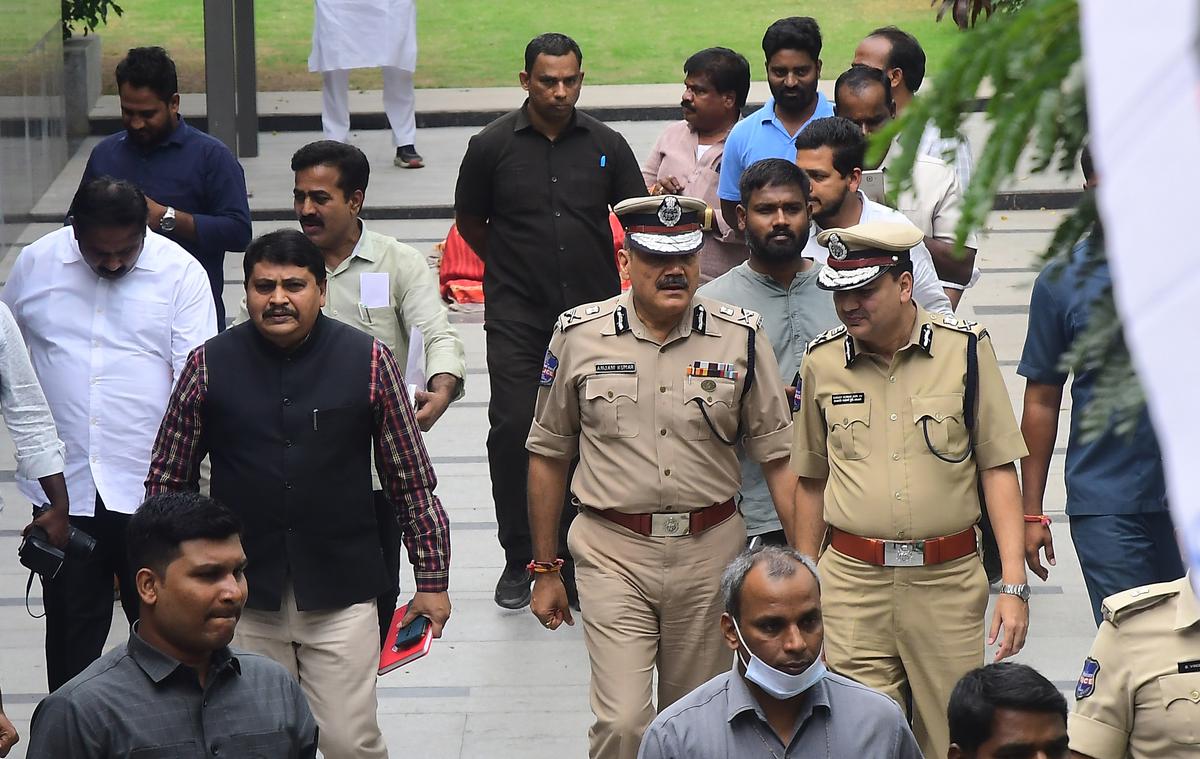 Director General of Police Anjani Kumar along with his team  coming out after meeting Telangana Pradesh Congress Committee president A. Revanth Reddy at the latter’s residence in Hyderabad on December 3, 2023.