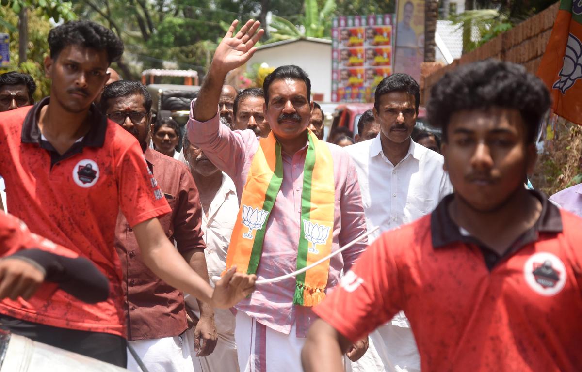 BJP candidate in Vadakara K. Dileep greeting voters in Adiyur.