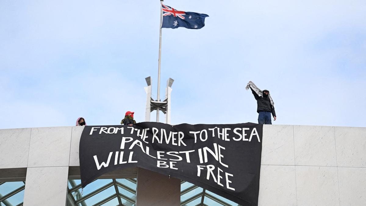 Pro-Palestinian protesters breach security at Australia’s Parliament House to unfurl banners