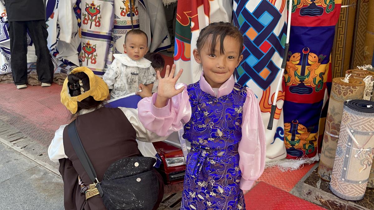 A Tibetan family in the marketplace outside Barkhor Square in Lhasa. 