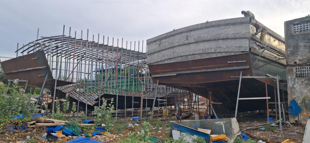 Ships under construction at the Nagapattinam boatyard as builders carry out final works.