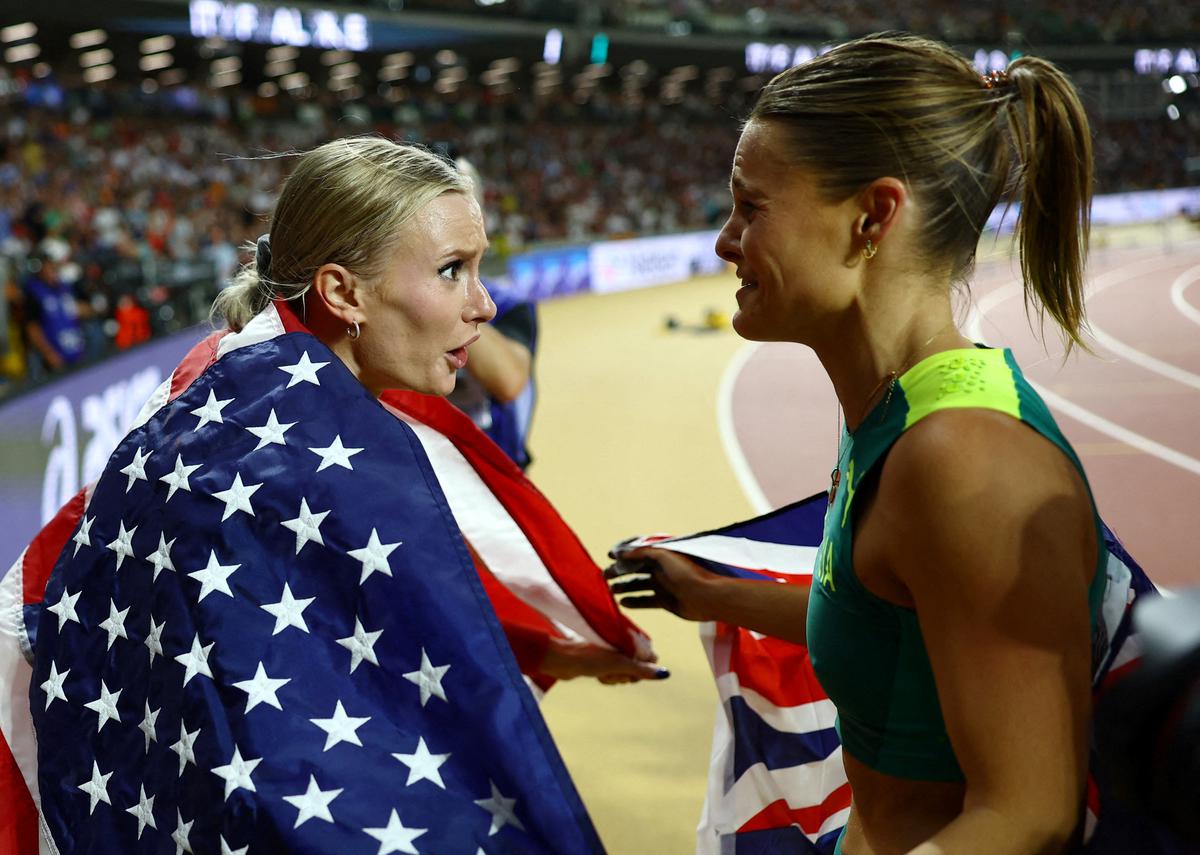 Australia’s Nina Kennedy and Katie Moon of The U.S. celebrate after winning joint gold in the women’s pole vault final at World Athletics Championship, Women’s Pole Vault Final, National Athletics Centre, Budapest, Hungary on August 23, 2023.