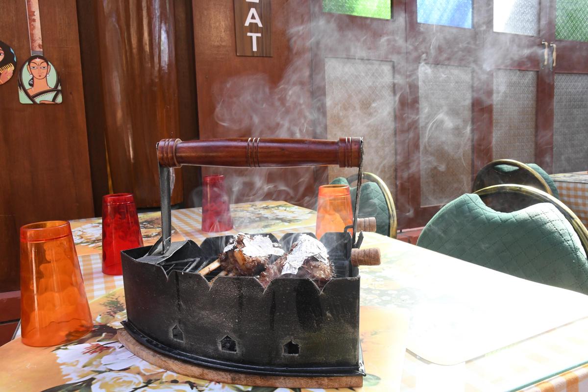 Chingar-style chicken kebab, finished table-side