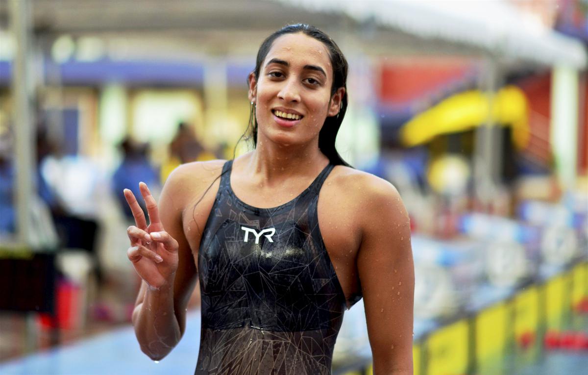 Maana Patel flashes the victory sign after the women’s 200m backstroke event at the 75th senior National Aquatic Championships, at the Zakir Husain Aquatic Complex in Guwahati, Wednesday, Sept. 7, 2022. 