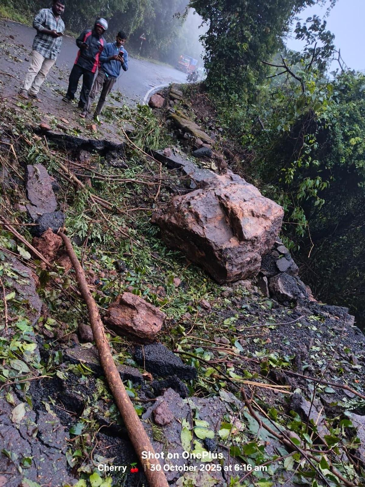 Heavy boulders lie on the ghat road near Paderu in Alluri Sitharama Raju district on Thursday, cutting off road connectivity to several interior villages. 