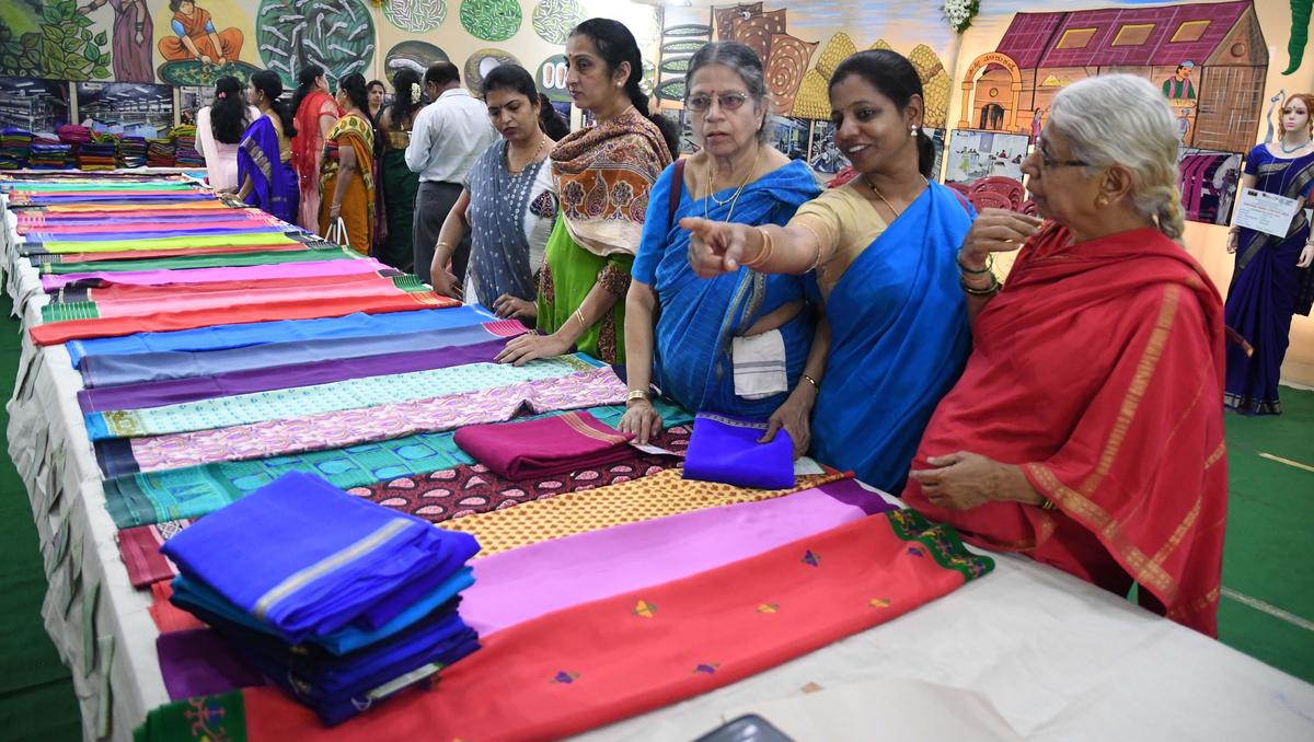 Visitors at an exhibition cum sale of KSIC Mysore Silk Vintage Saree in Bengaluru. Visitors at an exhibition cum sale of KSIC Mysore Silk Vintage Saree in Bengaluru.