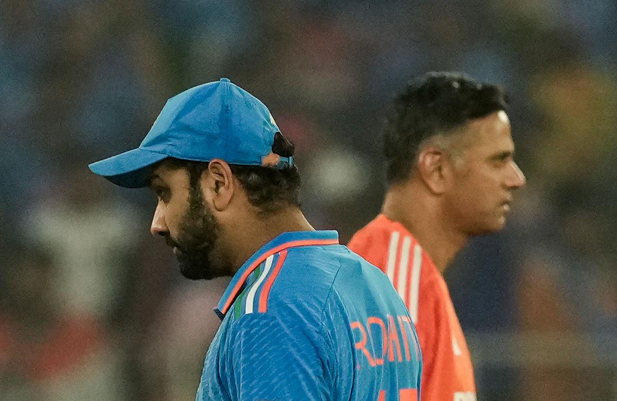 Captain Rohit Sharma and coach Rahul Dravid are seen after their team’s defeat in the ICC Cricket World Cup 2023 final against Australia in Ahmedabad on November 19, 2023.