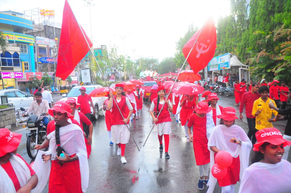 Red volunteers taking out a rally in Telangana’s Khammam town on Sunday in connection with inauguration of ‘Comrade Sattenapalli Ramakrishna Bhavan’ by CPI (M) senior leader and former Health Minister of Kerala K K Shailaja in the town. Photo Credit: By Arrangement