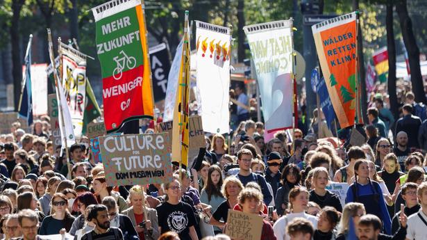 Protesters fear climate change impact, demand aid for poor