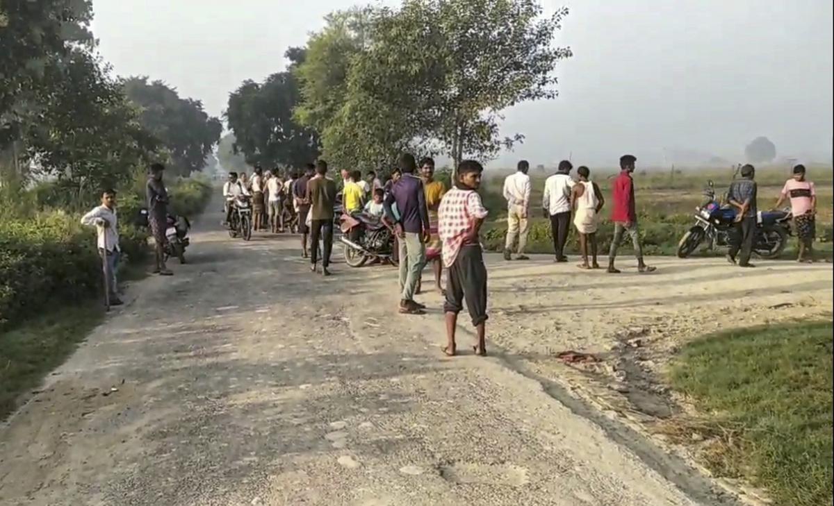 Locals gathered at the encounter site, in Unnao, on September 23, 2024.