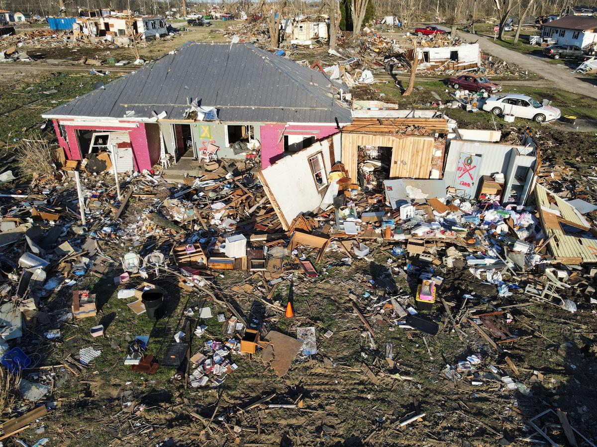 Two severely damaged homes are seen in a neighbourhood in the aftermath of a tornado in Sullivan, Indiana, U.S. on April 2, 2023.  