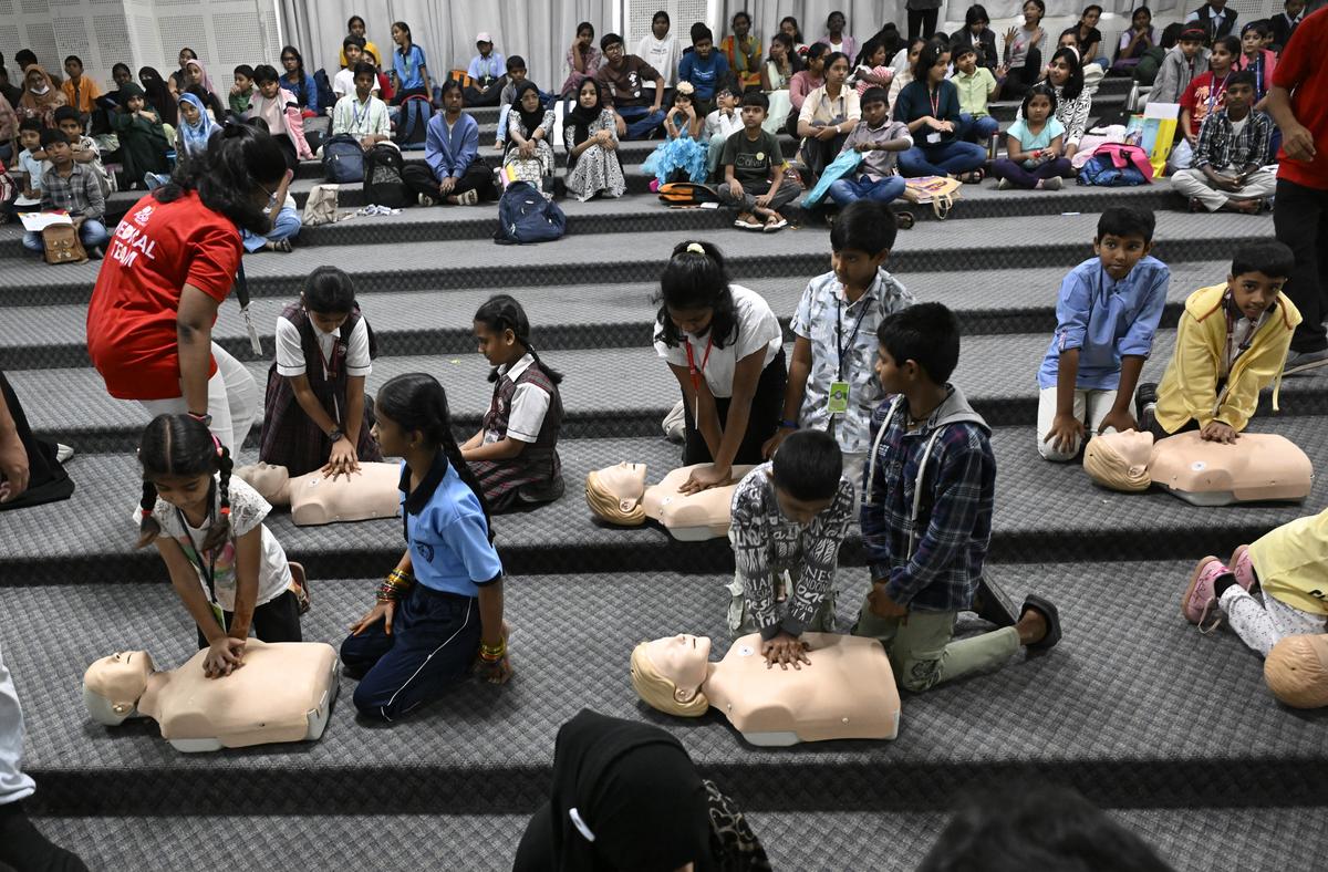 Schoolchildren being given CPR training on the occasion of World Heart Day at Apollo Hospitals in Hyderabad on Monday.