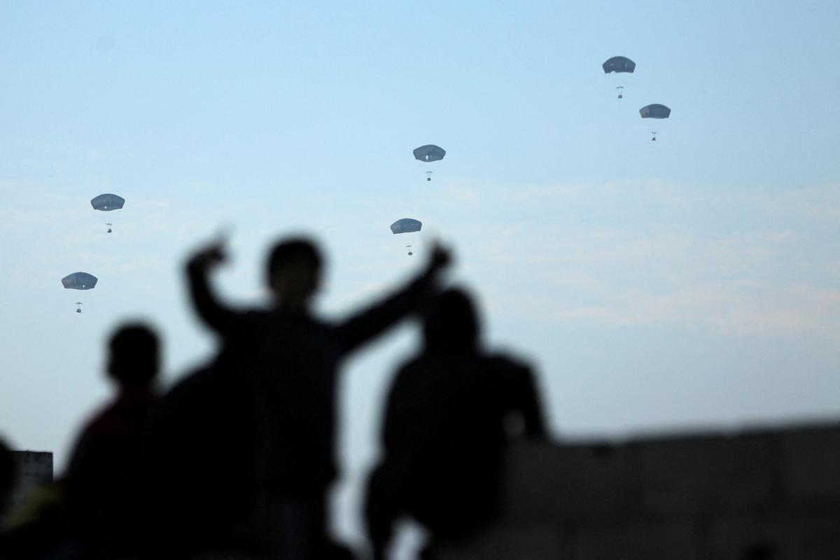 U.S. military aircraft airdrop thousands of meals into Gaza in emergency humanitarian aid operation