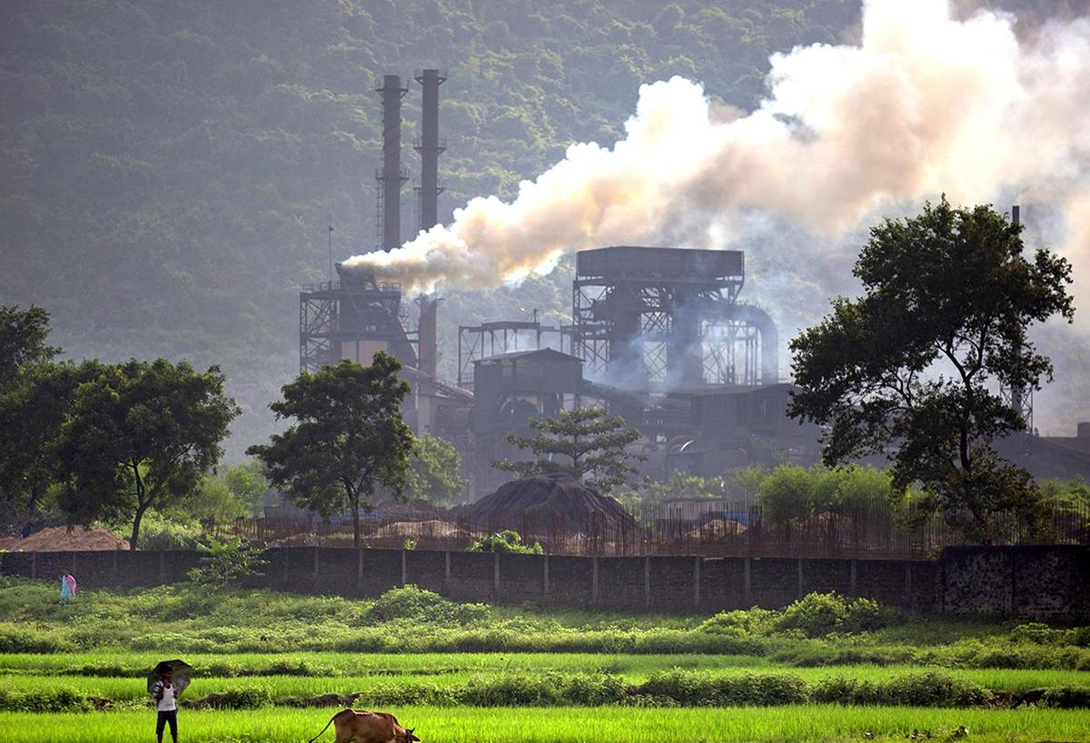 Rising fumes: Smoke rises from a coal-powered steel plant at Hehal village near Ranchi, in Jharkhand.