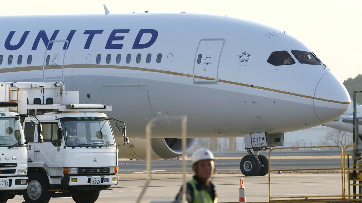 United Airlines flight fire: Passengers evacuated after engine sparks fire on wing during takeoff at Houston airport