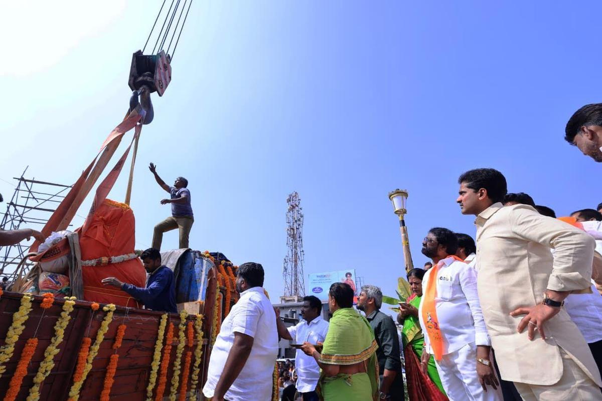 Ballari MLA Nara Bharath Reddy supervising the installation of the Maharshi Valmiki statue at S.P. Circle in Ballari on December 25, 2025.  
