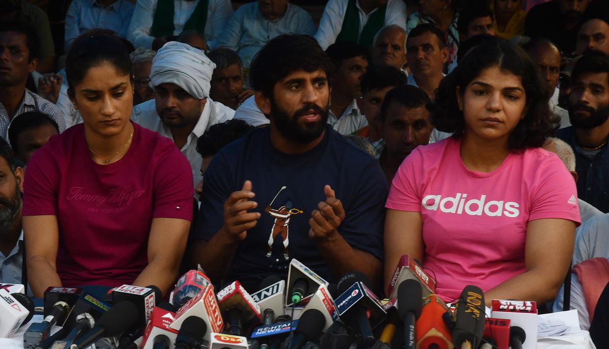 Vinesh Phogat, Bajrang Punia and Sakshi Malik address the media at Jantar Mantar on Thursday, May 4, 2023.