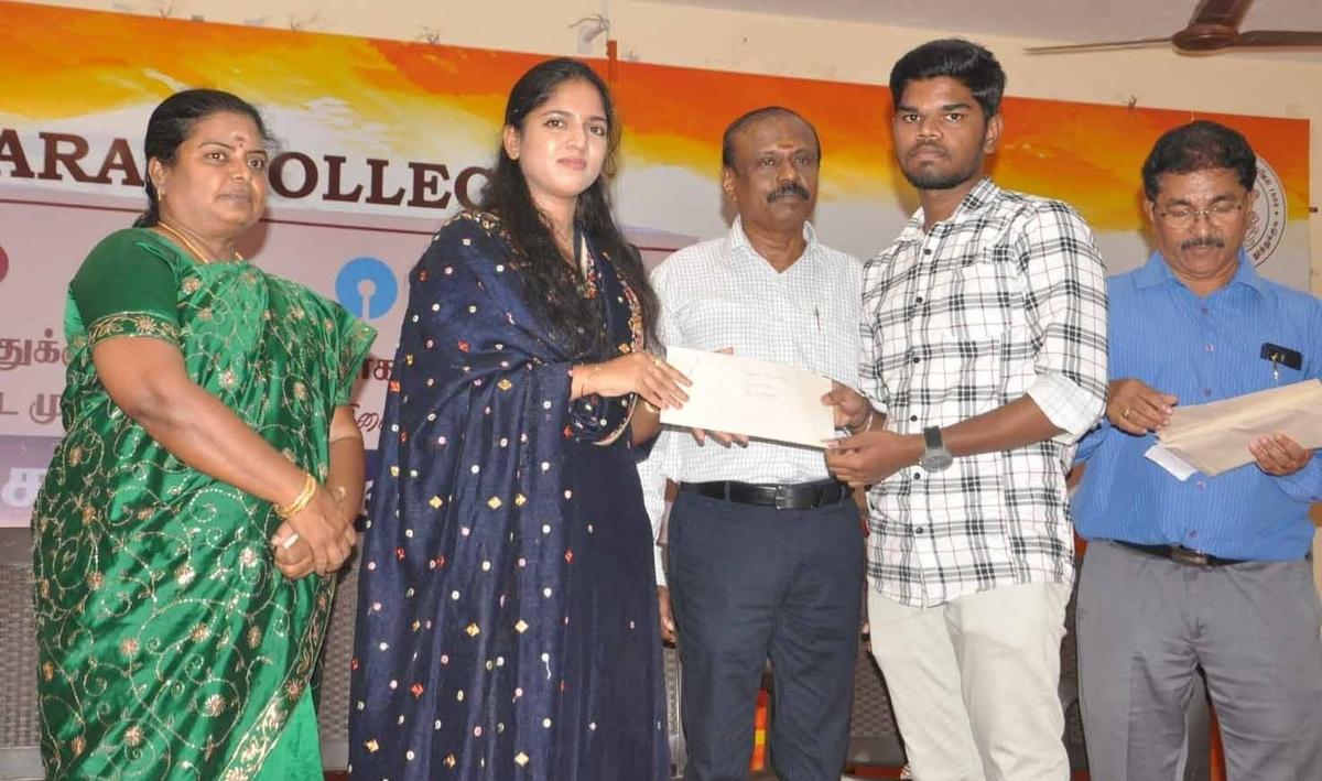 R. Ishwarya Additional Collector, Development, hands over education loan to a beneficiary in Thoothukudi on Thursday.