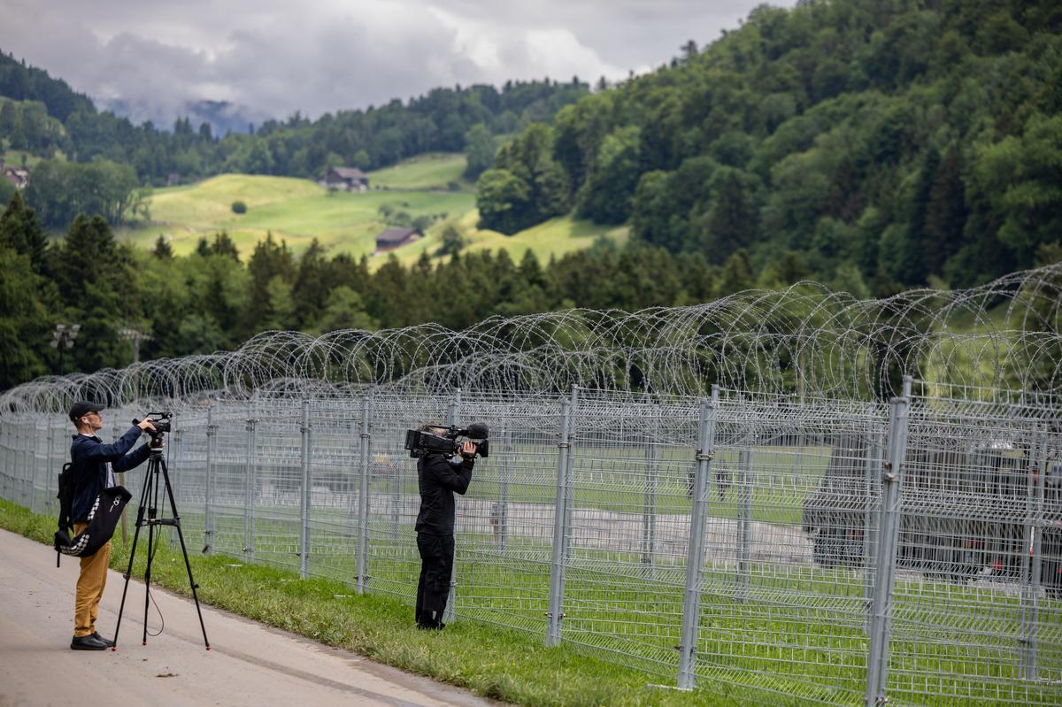 Members of the media are pictured during a guided visit to the security zone of the June 15-16 peace summit for Ukraine, in Obburgen near Burgenstock, Switzerland, June 10, 2024. 