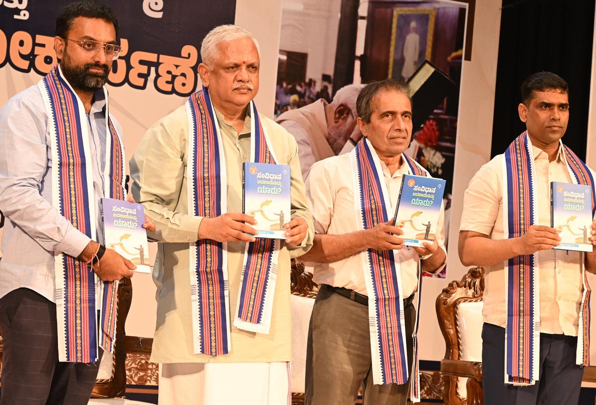 BJP national general secretary (organisation) B.L. Santosh releasing the book ‘Who Changed the Constitution?’ by Vikas Kumar P., in Mangaluru on Saturday. 