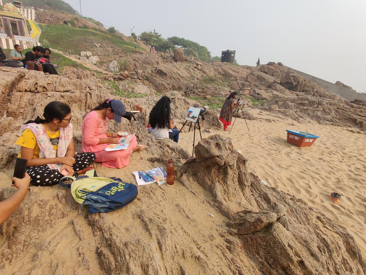 Artists, who are a part of Vizag Urban Sketchers, during a meet-up at Tenneti Park in Visakhapatnam. 