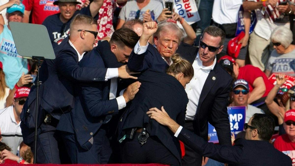 Donald Trump evacuated from stage after shooting at rally, Biden says ‘no place for this kind of violence’