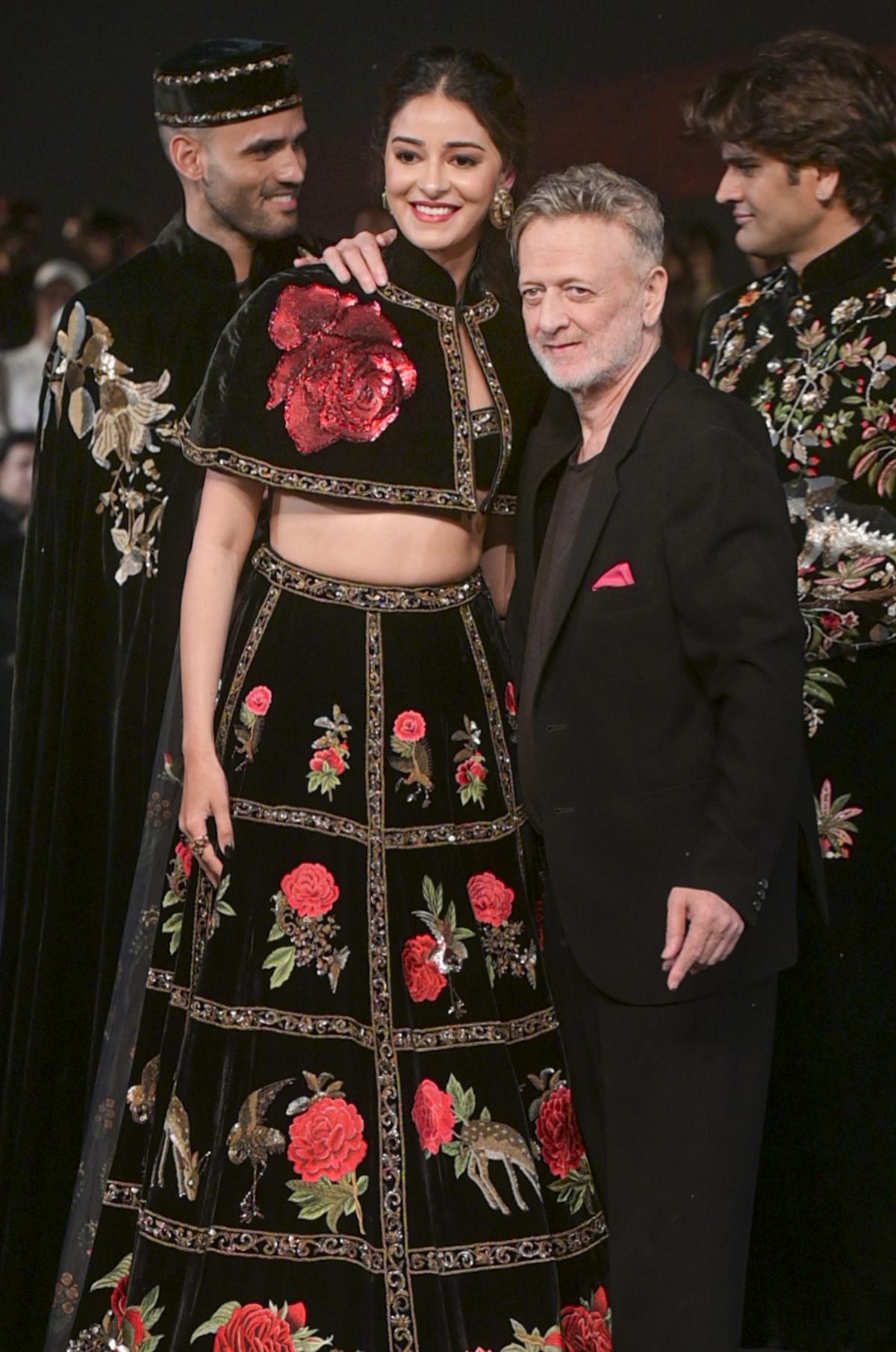 Rohit Bal with actor Ananya Pandey at Lakme Fashion Week, October 2024.