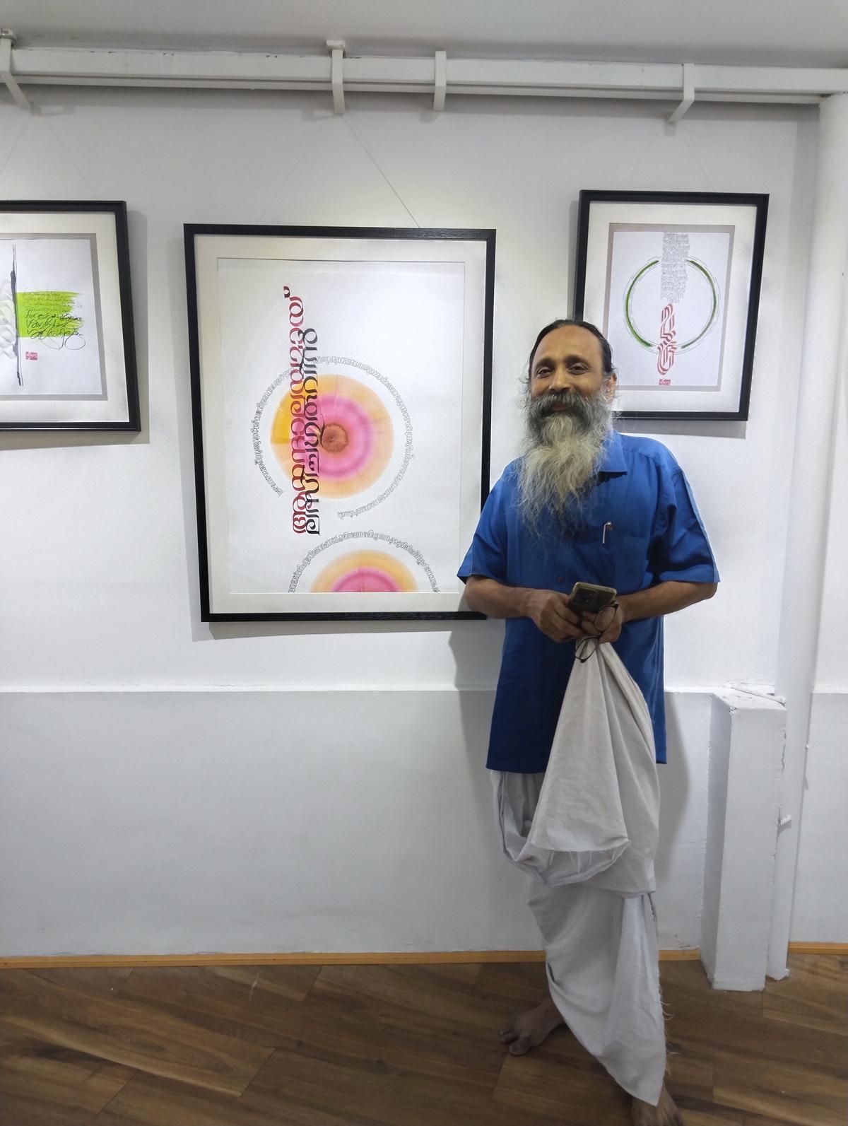 Calligrapher Artist Bhattathiri exhibits works based on Kumaran Asan's poems at Ka Cha Ta Tha Pa, his gallery for Malayalam calligraphy, in Thiruvananthapuram