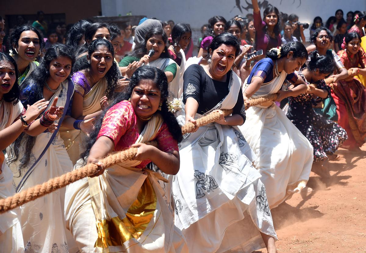 Students of the Government College for Women take part in a tug of war contest organised as part of Onam celebrations in Thiruvananthapuram on Friday