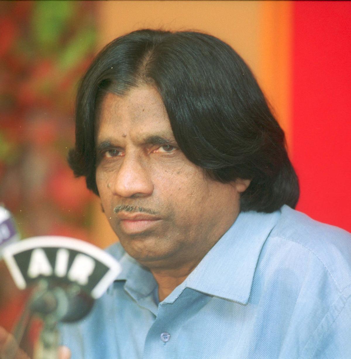 E. Balagurusamy, then Vice-Chancellor of Anna University in Chennai, in 2004
