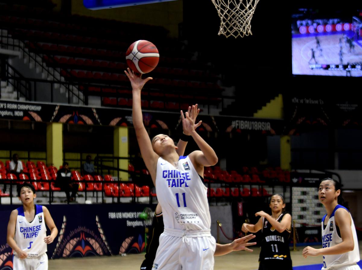 Yu Wen Hsiao of Chinese Taipei in action against Indonesia in the FIBA U18 Women’s Asian Championship Division A at the Sree Kanteerava Indoor Stadium in Bengaluru on Thursday, 8 September, 2022. 