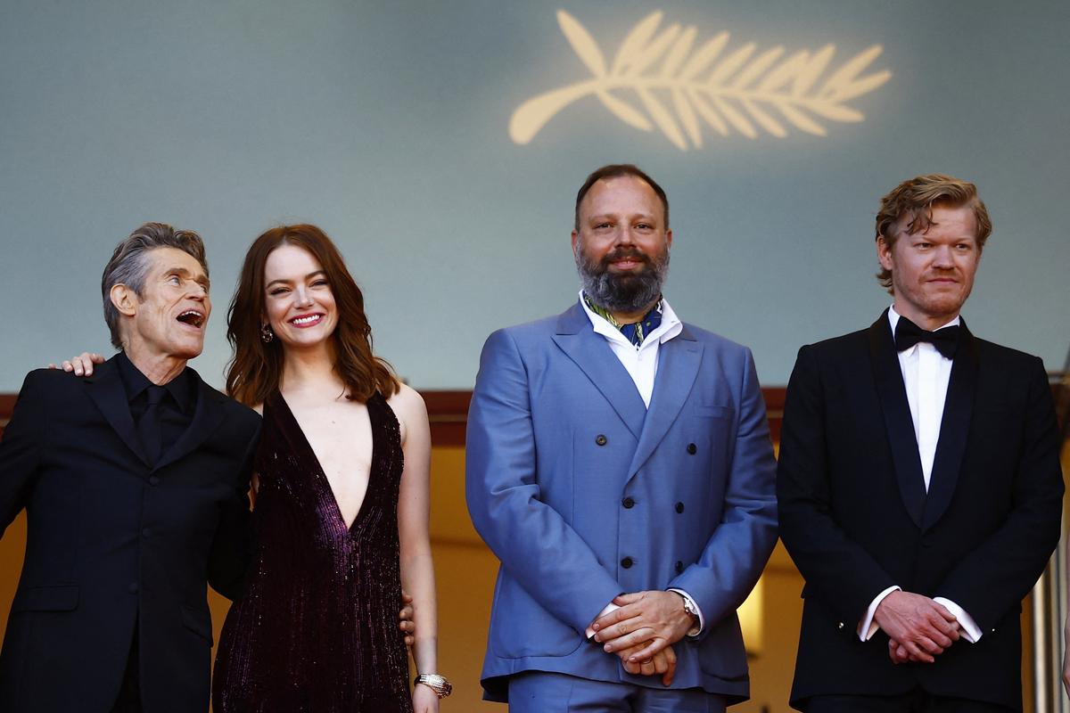 Director Yorgos Lanthimos, cast members Willem Dafoe, Emma Stone and Jesse Plemons pose on the red carpet during arrivals for the screening of the film ‘Kinds of Kindness’ in competition at the 77th Cannes Film Festival